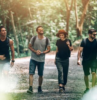 group of standing at sunrise
