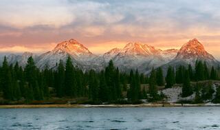 a road in the desert surrounded by mountains