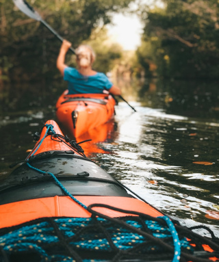 2 canoes in a river