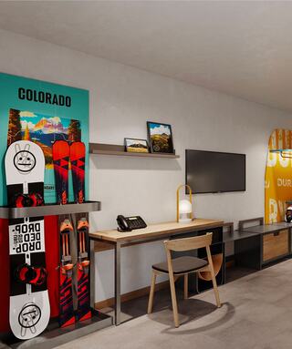 Ski, snowboard, and boots storage rack built in.